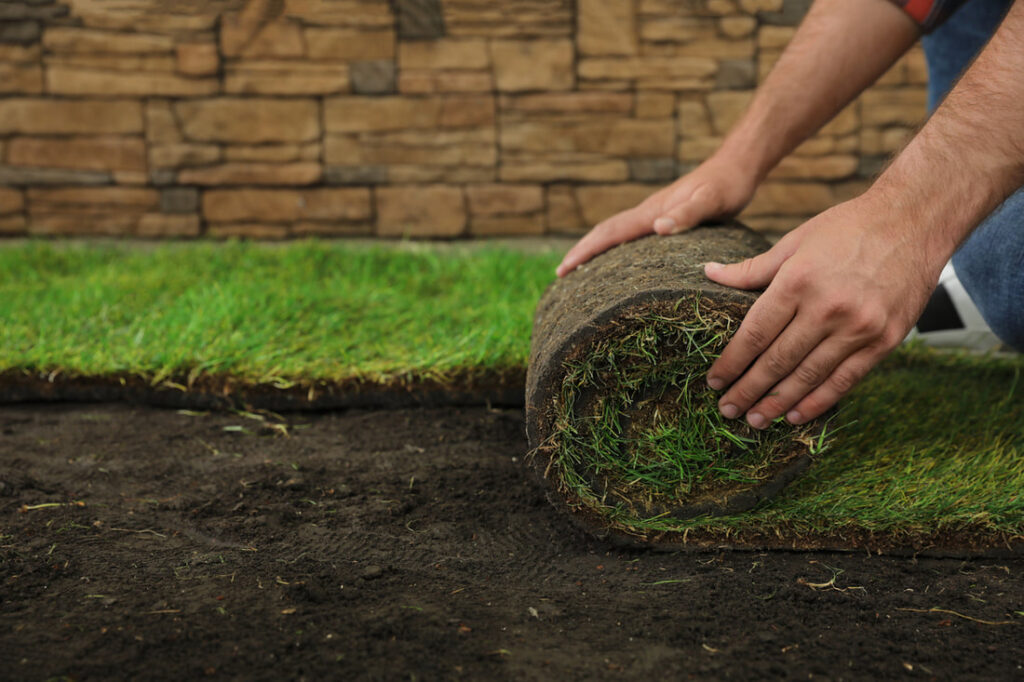 laying-artificial-turf-on-dirt